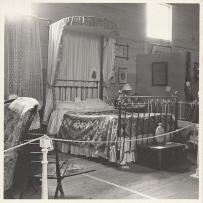 A Bedroom kitchen exhibit at the 1962 exhibition of the Howick Historical Society in the Howick Town Hall.; 1962; P2022.10.07