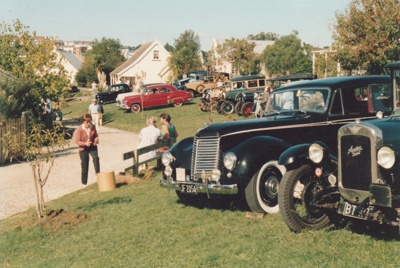 A lne up of vintage cars at the Mayday celebrations at Howick Historical Village.; La Roche, Alan; 3 May 1987; P2021.168.10