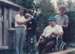 Graeme McDonald, Alan la Roche, Brent ??? and Archie Somerville at the opening of Somerville's cowshed in the Howick Historical Village. 

; La Roche, Alan; 16 November 1986; P2020.23.06
