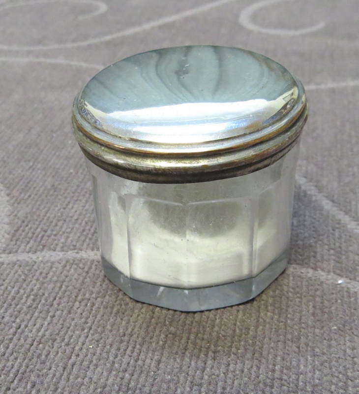Dressing case content Small round glass pot with silver lid.; 1850