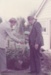 Pat Hunt, MP for Pakuranga and A la Roche planting a tree at the opening of Johnson's cottage in Howick Historical Village. ; Young, Robert; 18 July 1982; P2020.117.06