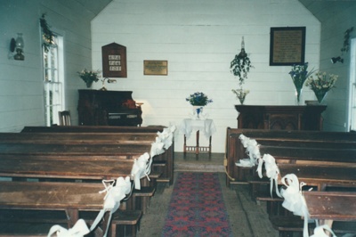 The Howick Methodist Church interior, decorated for a wedding. in the Howick Historical Village. ; 2013; P2020.40.12