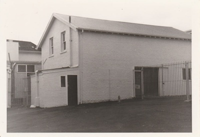Rice's Bakehouse, behind the shops on Picton Street above Fencible Drive.
Built in 1922 for Hughes, later Rices and Klissers.; La Roche, Alan; c1985; P2022.83.04