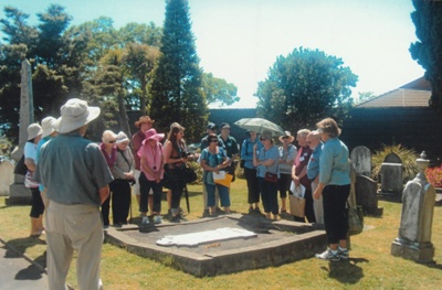 30 members of the Howick Historical Society on an historical walk around the graveyard at All Saints' Church.; La Roche, Alan; 23 November 2013; P2022.36.02