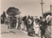 An unnamed swagman pushing a pram and others in the 1947 Howick Centennial Parade.; N.Z. Herald; November 1947; P2022.38.07