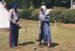 Alan la Roche and a lady, both in costume playing croquet on a Live Day in Howick Historical Village.; P2021.121.07