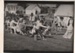 People watching children playing tug of war  in Howick Historical Village.; Spencer, LInda, East City News; August 1983; P2021.121.08