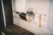Sink on the wall in the laundry behind Puhinui's kitchen. Cupboards are on the adjacent wall.; Alan La Roche; March 2002; P2020.14.31