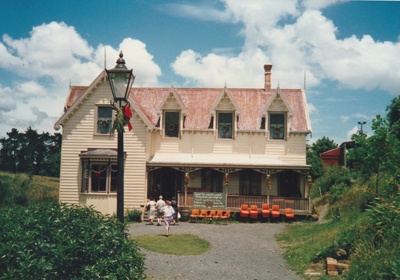 Christmas, past and present at Howick Historical Village, 12 December 1987. Puhinui with chairs outside.; Smith, Christina; 12 December 1987; P2021.195.03