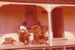 Patricia Rose and Margaret Willis spinning on Sergeant Barry's verandah on a Live Day in Howick Historical Village. ; P2021.98.14