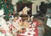 Christmas, past and present at Howick Historical Village, 12 December 1987. A display of teddy bears and a rocking horse in front of the Christmas tree.; Smith, Christina; 12 December 1987; P2021.191.09