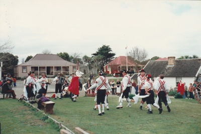Morris dancers on the green at Howick Historical Village.; c1995; 2019.133.23