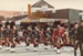 The Howick Pipe Band marching along Picton Street, Howick.; 1982; P2021.138.01