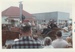 The crowd watching a man and woman in costume in a horse-drawn gig in the Howick Santa Parade, 30th November 1960.; Young, Heather; 30 November 1960; P2022.06.05