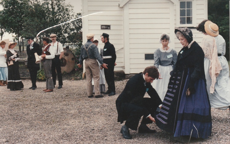 Actors and actresses in period costume outside the courthouse in ... section 2