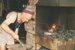 Stan Butler at work in  Wagstaff's Forge in Howick Historical Village. ; Smith, Christina; 1987; P2020.154.01