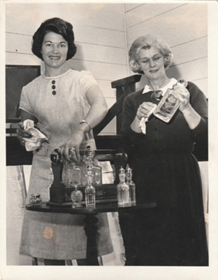 Alwyn White (or Zellerman) and Dee Collings at the 1964 exhibition of the Howick Historical Society in the Howick Town Hall.; October 1964; P2022.11.01