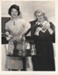 Alwyn White (or Zellerman) and Dee Collings at the 1964 exhibition of the Howick Historical Society in the Howick Town Hall.; October 1964; P2022.11.01