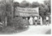 Visitors at the sod cottage at the Howick Historical Village.; P2020.50.05