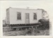 Smallman's cottage on a trailer; La Roche, Alan; 1/08/1973; 2018.089.26