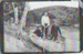 3 boys in a dinghy on Manurewa Stream.; 2018.372.01