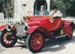 Geoffrey Fairfield, in black top hat, a passenger in the 1912 vintage car outside the Church in the Howick Historical Village.; 2018.333.74
