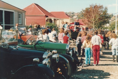 A lne up of vintage cars at the Mayday celebrations at Howick Historical Village.; La Roche, Alan; 3 May 1987; P2021.168.09