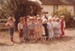 Rosemary McLean with a class, all in costume outside Briody-McDaniels Cottage, formerly McDermott's Cottage at Howick Historical Village.

; March 1984; P2020.101.07
