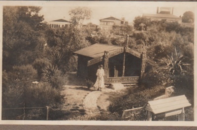 Miss Nixon standing in front of Torere Ngai Tai.; 20/10/1936; 2019.091.01