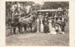 A  picnic party in the Waitakeres standing in front of their horse drawn bus.; 1912; P2021.152.01