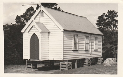 Howick Methodist Church on supports after it was moved to the Howick Historical Village.; Young, Robert; 1977; P2020.34.11