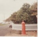The red postbox outside the Howick Historical Village; Harris, Josie; 1980s; 2019.111.01