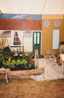 Howick Historical Society's entry at the Ellerslie Garden Show, "Now and then", November 2002. ; La Roche, Alan; November 2002; P2022.03.07