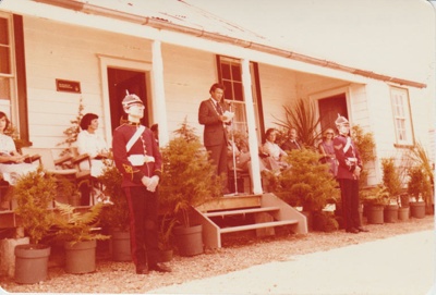 The official party on the verandah of Eckfords Homestead.; 8/03/1980; 2019.100.21