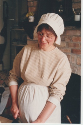 Barbara Doughty in costume in a Fencible Cottage; 1993; 2019.144.03