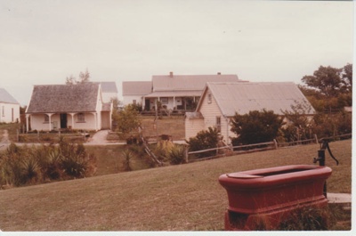 Sergeant Barry's Cottage, The Parsonage, Whites Store and the horse trough (foreground).; c1983; 2019.108.01