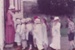 Sue Mansergh and a class of schoolchildren, all in costume, at Howick Historical Village.; 1984; P2021.107.01