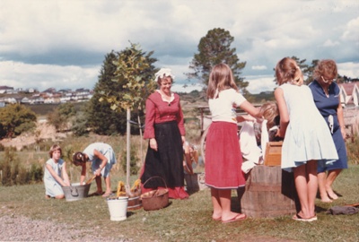 Cockle Bay School visit being shown how washing was done by Sue Mansergh, an interpretation guide.; March 1982; P2021.95.03