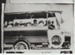 Crawford's bus with side curtains rolled up; c1930; 2017.494.65