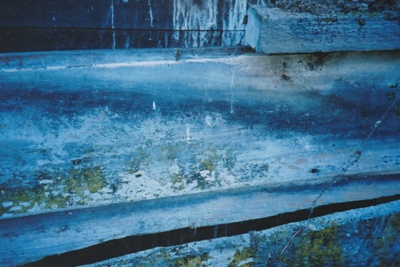 A detail of light cream paint preserved under the window sill and weatherboard on James Grigg's cowshed on the Whitford farm.; La Roche, Alan; 23 March 2005; P2021.90.24