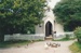 A rooster and ducks in front of the Howick Methodist Church. ; 1990s; P2020.34.08