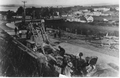 Construction of concrete road, Howick; circa 1930; 9861