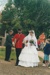 Matthew Bonnet (65th regiment) and Rowan Southern as bride and groom in their costumes for the fashion parade outside Puhinui on an HHV Live Day. ; Palmer, Ros; October 2003; 2019.198.29