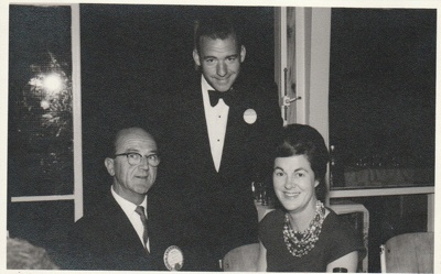 Eileen and Austen Martensen with a representative of Lions International at the 1962 exhibition of the Howick Historical Society in the Howick Town Hall.; Howick Sudios, Moore Street; 1962; P2022.10.01