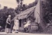 A lady and 2 girls in costume outside the Sod Cottage, Howick Historical Village on a Live Day.; La Roche, Alan; P2020.45.01