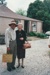 Alan la Roche (in costume) with Muriel Ashby outside Eckford's Homestead.; 2004; P2021.116.01