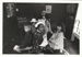 Children and a teacher, all in costume, in the Dame School in Howick Historical Village. ; Howick & Pakuranga Times; P2021.55.01