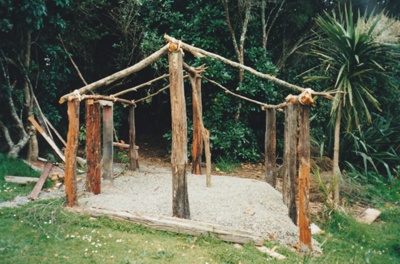 Hemi Pepene's whare (cottage) at the Howick Historical Village, showing the foundarions and structure in place..; La Roche, Alan; December 2000; P2020.96.01