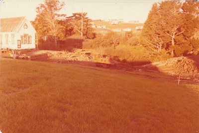A bulldozer digging out the pond in the Howick Historical Village.; La Roche, Alan; 24 April 1979; P2022.19.03