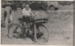 Brian O'Connel standing behind a delivery bike from Scotts Store, Cockle Bay, preparing for the 1947 Centennial Celebrations.; 8 November 1947; P2022.38.46